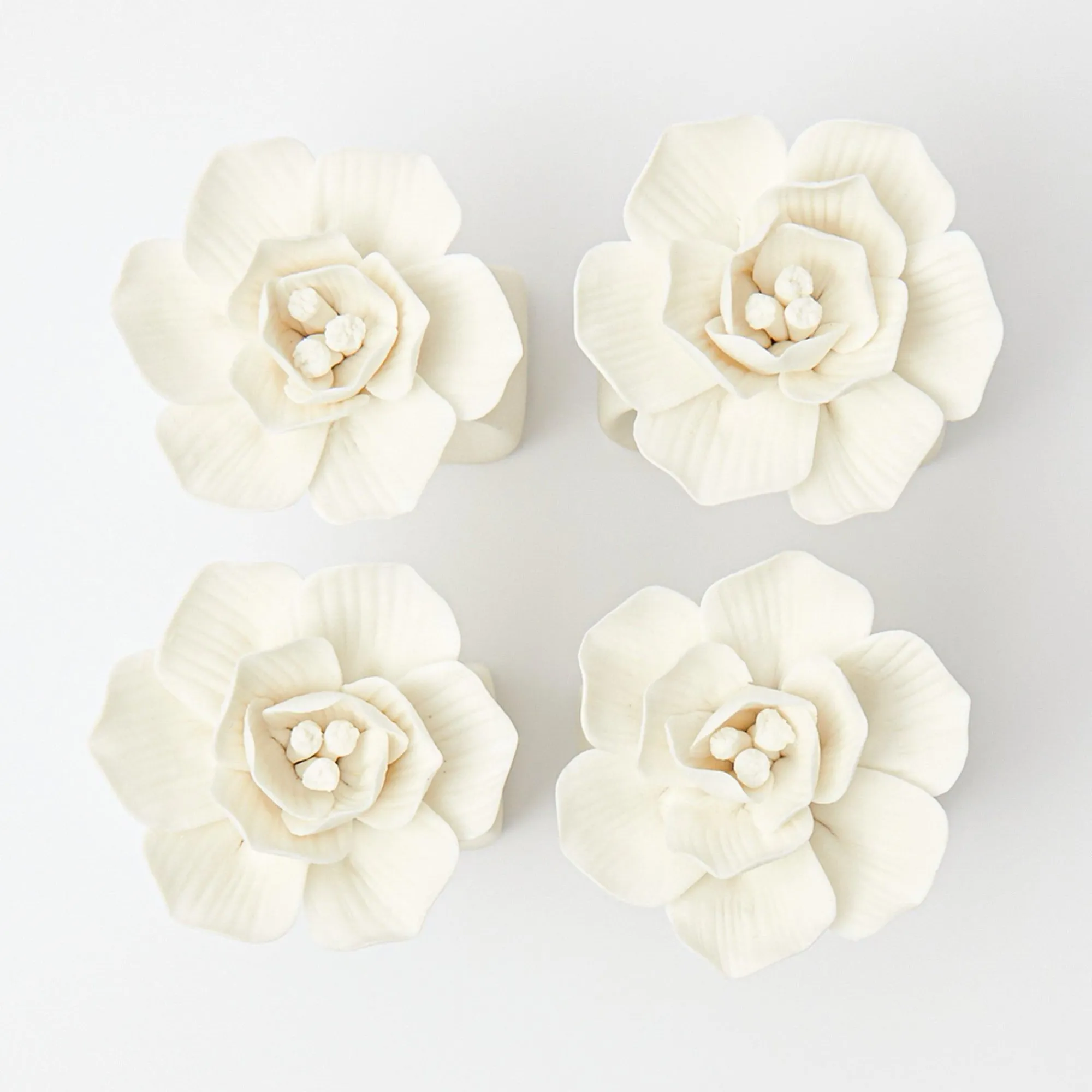 fiore_porcelain_napkin_ri_0.webp Shop Fiore Porcelain Napkin Rings (Set Of 4) Napkin Rings, Bows & Wreaths
