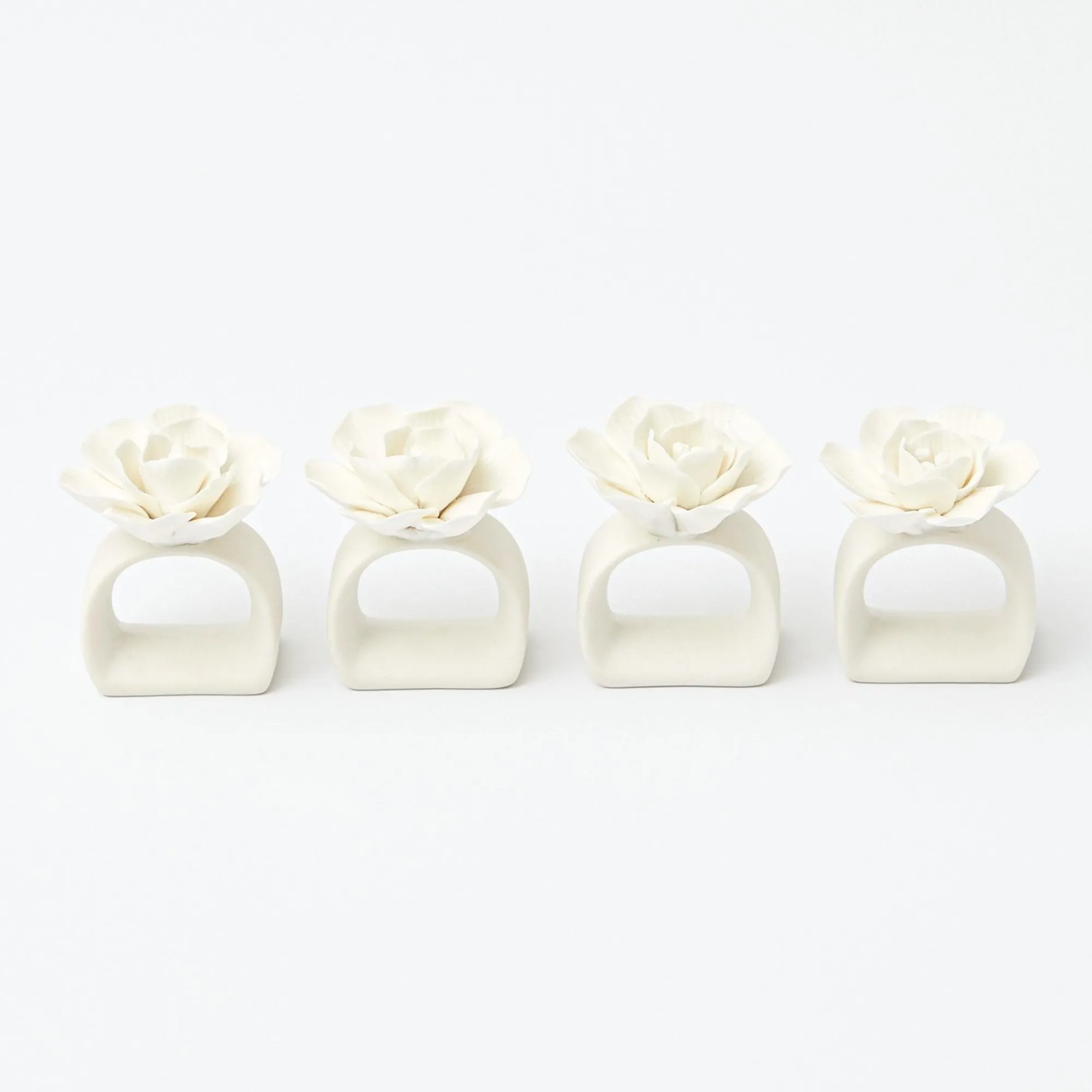fiore_porcelain_napkin_ri_18.webp Shop Fiore Porcelain Napkin Rings (Set Of 4) Napkin Rings, Bows & Wreaths