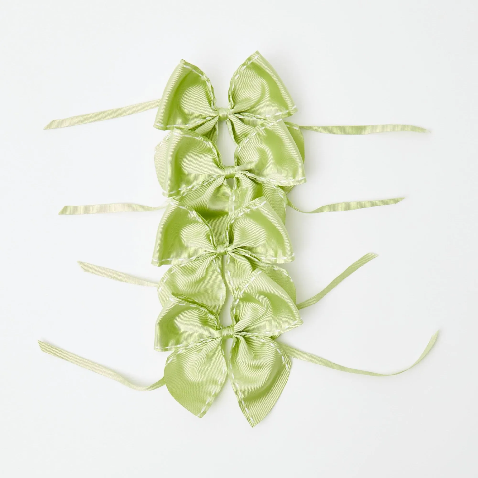 green_saddle_stitch_napki_0.webp Clearance Green Saddle Stitch Napkin Bows (Set Of 4) Napkin Rings, Bows & Wreaths